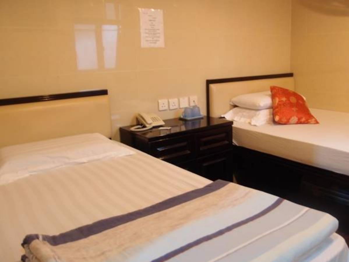 Lily Guest House Цзюлун Экстерьер фото